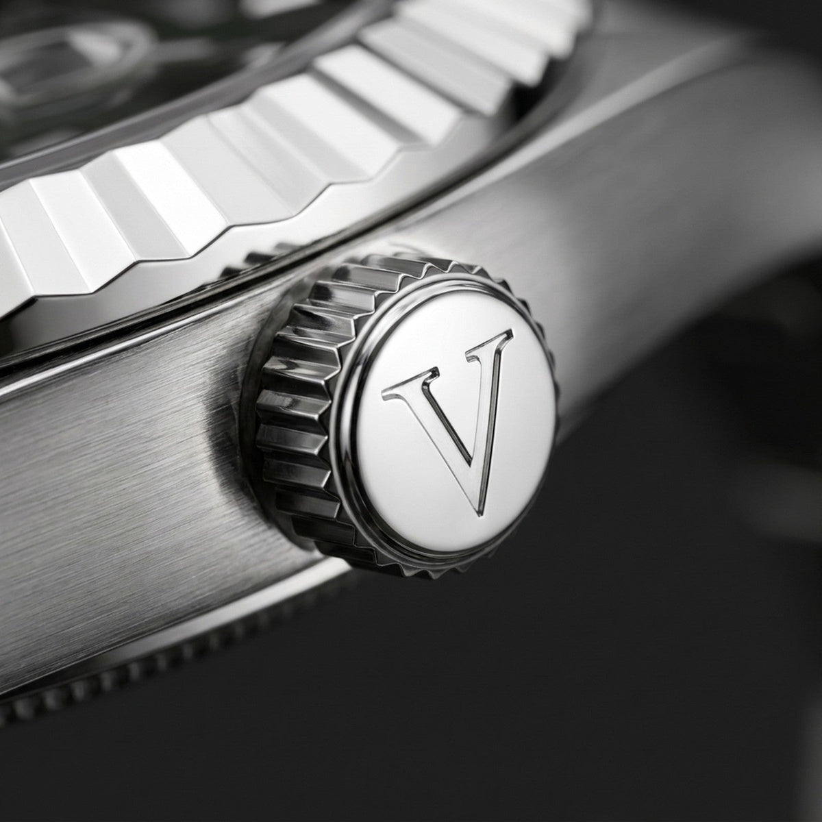 Crown with engraved V